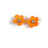 Pair of orange crochet flower earrings on a white background