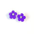 Pair of dark purple crochet flower earrings on a white background