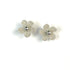 Pair of silver crochet flower earrings on a white background