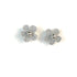 Pair of silver crochet flower earrings on a white background