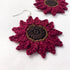 Crocheted flower earrings on a white background